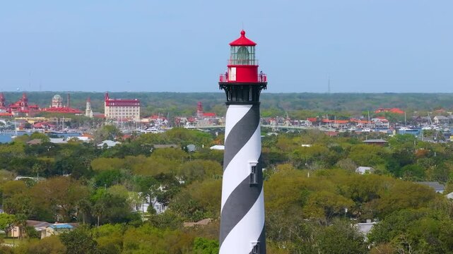 St. Augustine, Florida. Historical lighthouse on ocean shore for ships navigation.