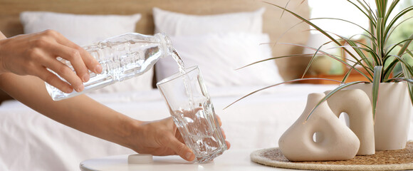 Bottle of water in bedroom