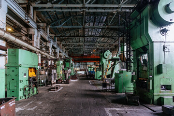Fototapeta premium Heavy mechanical engineering factory production line. Interior of workshop