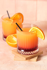 Glasses of tasty mai tai cocktail on table