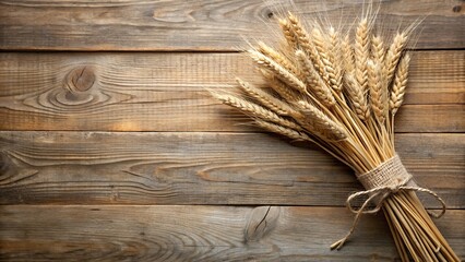 Natural dried wheat stalks arranged on wooden planks, symbolizing harvest, farming, and organic food concepts
