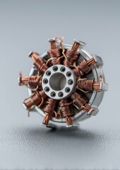Obraz premium Close-up of Small Electric Motor Stator with Copper Windings and Metal Housing