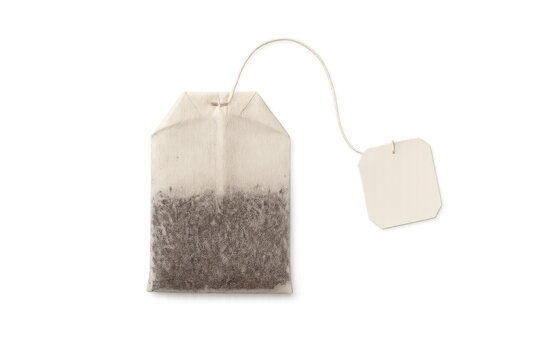 Unused tea bag with blank label against transparent backdrop, ready for personalized branding and creative design applications