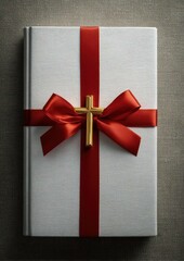 Elegant Christian gift: A Holy Bible adorned with a golden cross and red ribbon