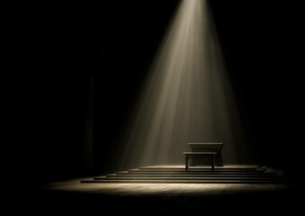 Illuminated stage with wooden furniture and stairs, bathed in focused spotlight