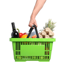 Man holding shopping basket with different products on white background, closeup