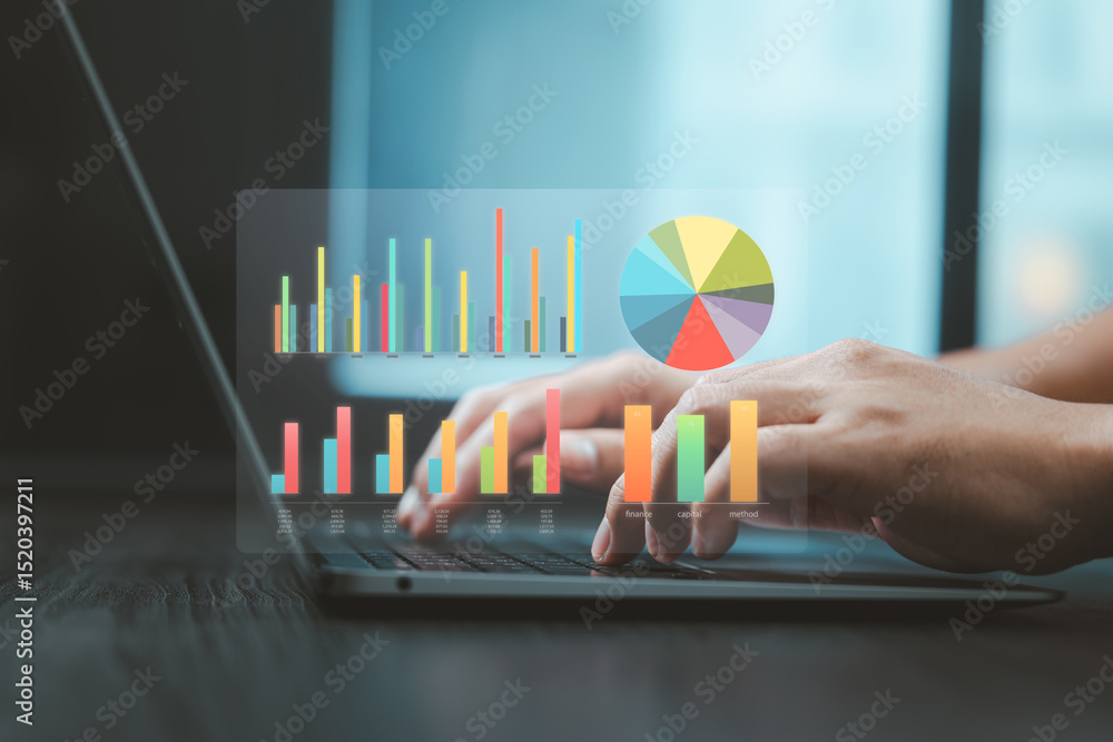 Poster colorful chart graphs and pie diagram hovering over hands typing on laptop for business analytics