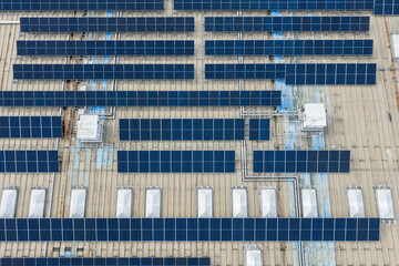 solar photovoltaic cell and pipes for air conditioned on a shopping mall building roof