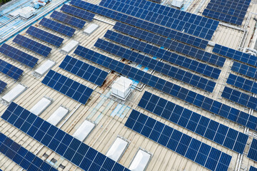 solar photovoltaic cell and pipes for air conditioned on a shopping mall building roof