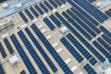 solar photovoltaic cell and pipes for air conditioned on a shopping mall building roof