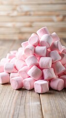 Pile of Fluffy Pink Marshmallows on Wooden Table