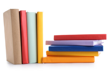 Many colorful books on white background