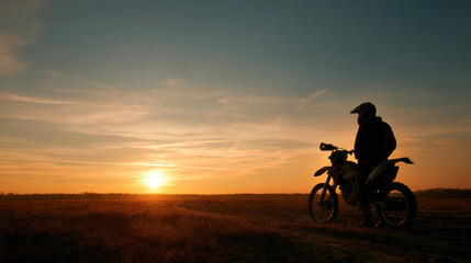 Obraz premium Motocross Rider at Sunrise
