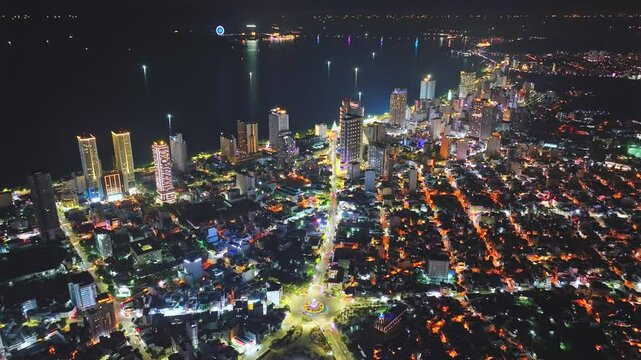 Aerial view of Nha Trang city at night. This is a famous city for cultural tourism in central Vietnam