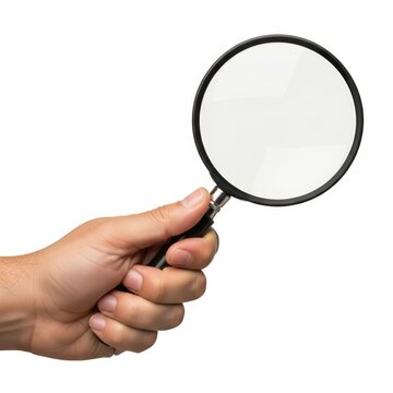 Fototapeta Hand Holding Magnifying Glass. A hand holding a magnifying glass isolated on a white background