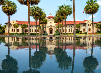 The Entrance to the public university, Valdosta State University, reflected in the water fountain.,...