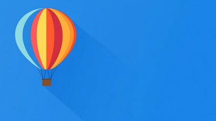 Naklejka premium Colorful hot air balloon against a vivid blue sky.