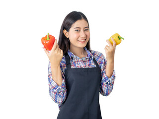 Young Asian woman wearing apron holding red and yellow bell peppers, smiling and posing isolated on a transparent background, concept of healthy food, organic vegetables, and farming lifestyle