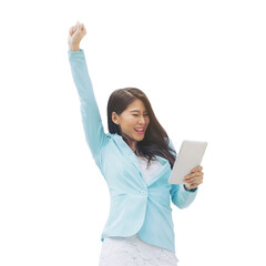 Excited Asian businesswoman in light blue suit raising arm in success while holding digital tablet,...