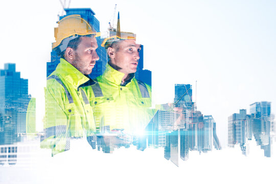 The double exposure image of the engineer standing back during sunrise overlay with cityscape image and futuristic hologram. The concept of engineering, construction, city life and future.