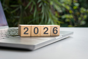 2026 on square blocks on top of laptop