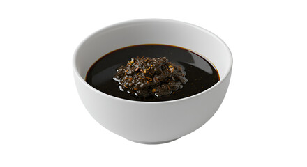 Black Sauce with Chili Flakes in White Bowl