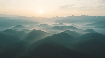 Fototapeta premium Misty Mountain Range from Drone Perspective