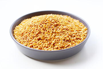 Organic golden flaxseeds, rich in omega-3, fiber, and antioxidants