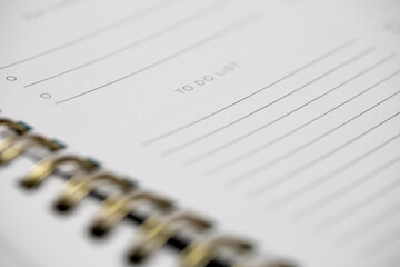 closeup of a blank to do list in a spiral notebook