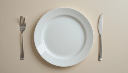 Empty White Plate Surrounded by Fork and Knife on Beige Background