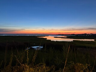 Obraz premium sunset over the river