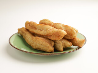 Fried donuts on green plate