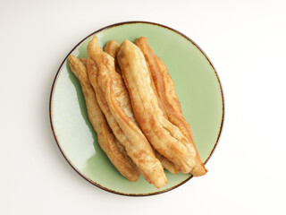 Fried donuts on green plate