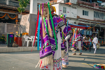 Colorful traditional Mexican dancers Danza de los Viejitos in Janitzio
