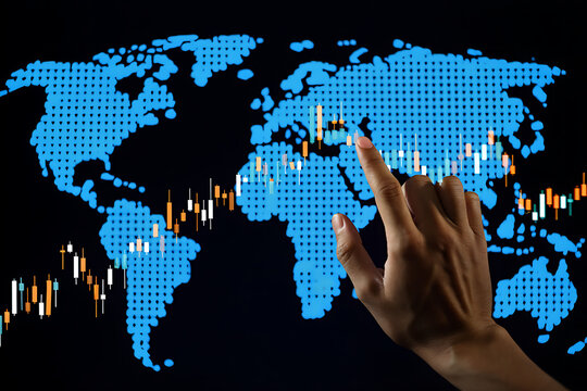 Finger pointing at global financial data depicted on a world map representing market analysis and trading insights