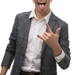 Young man smiling and making a fun gesture while dressed in a blazer