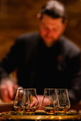 glencairn-glass-filled-with-whiskey-on-platter-bar