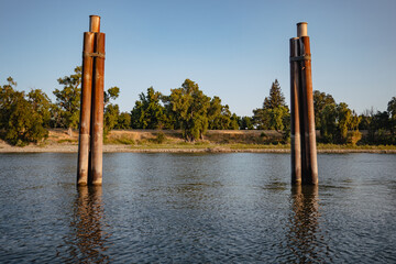 Obraz premium River Pilings at Sunset in California 