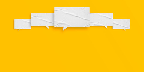 White speech bubble crumpled paper isolated on yellow background