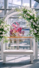 Fototapeta premium White floral archway with bench