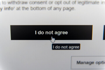  Close-up of a computer screen with a cursor hovering over the I do not agree button on a consent...