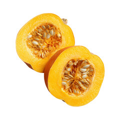 Two halves of a pumpkin showing the seeds on a white background in a studio shot close up view