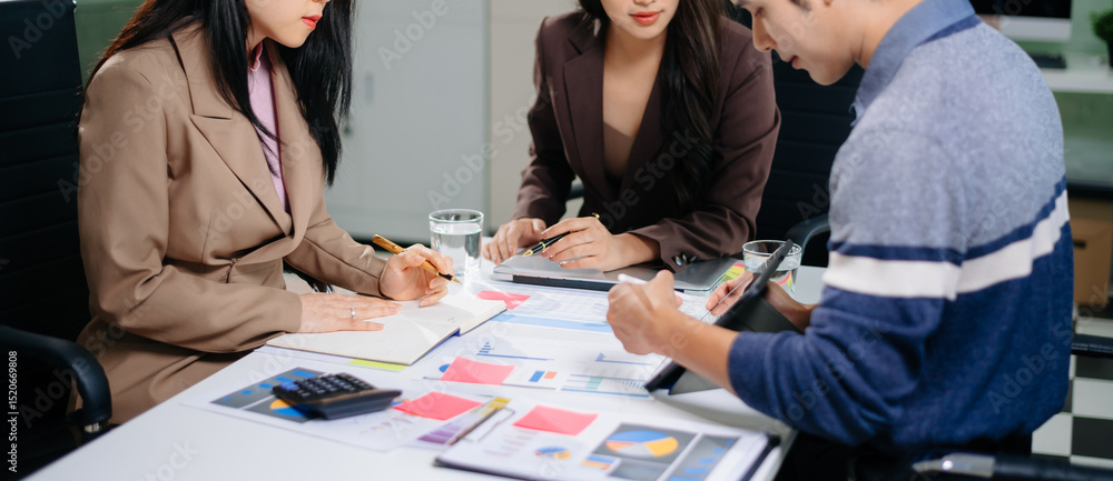 Poster business documents on office table with smart phone and calculator digital tablet and graph business