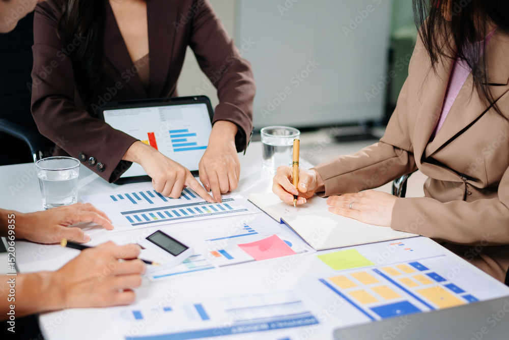 Poster business documents on office table with smart phone and calculator digital tablet and graph business