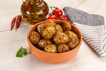 Baked mini potato with herbs