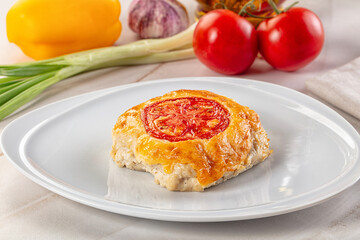 Chicken chop cutlet with cheese and tomato
