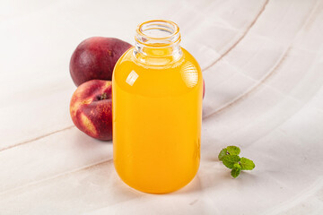 Vitamin beverage - peach juice glass