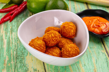 Fried crispy yellow cheese balls