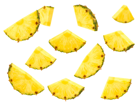 Scattered pineapple slices, vibrant yellow, juicy, sweet