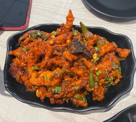 Crispy Fried Indian Chinese Style Chicken on Plate